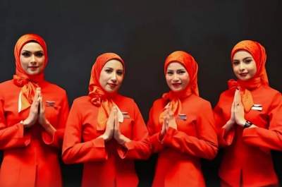 مهمانداران ایرآسیا محجبه می‌شوند